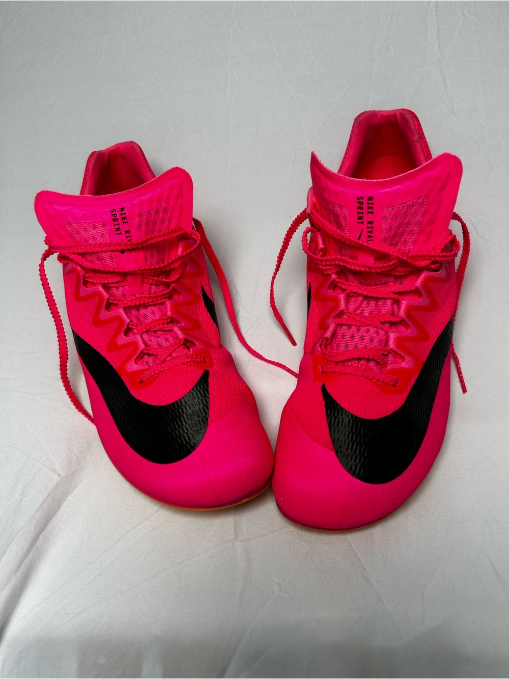 Nike Bright Pink Athletic track with Black Swoosh men’s 10/1/2